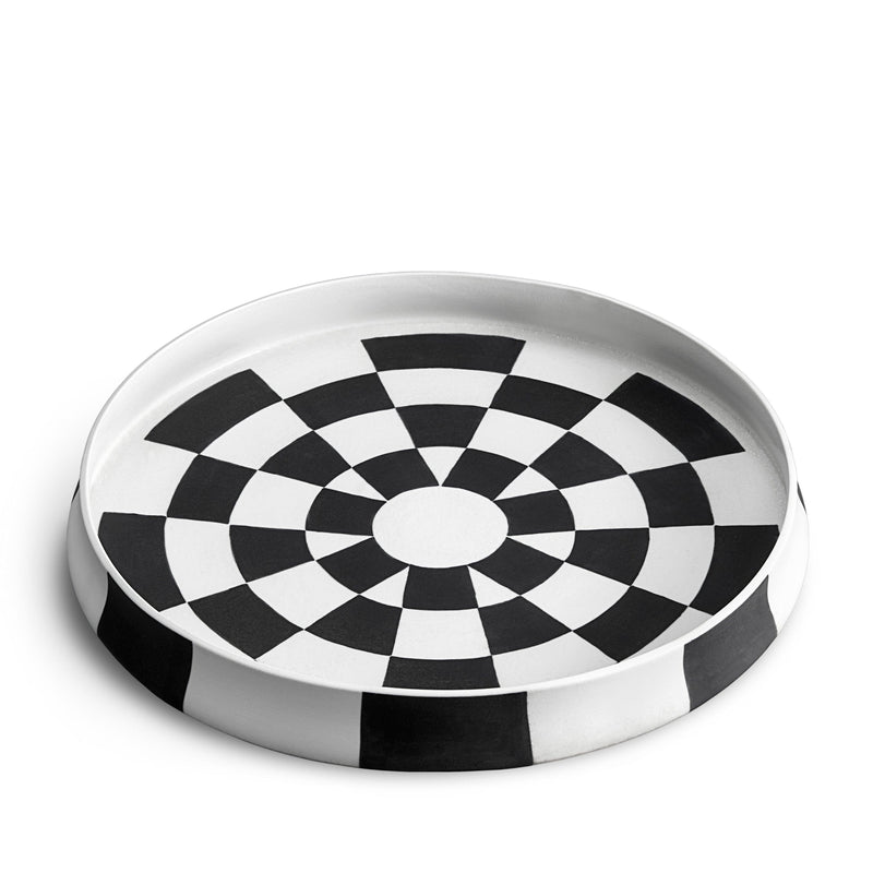 Black and white checkerboard glaze pattern on a low, large round porcelain platter.