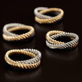 Deco Twist Napkin Jewels in gold and platinum