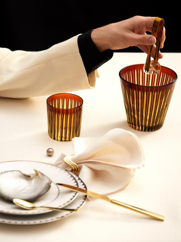 Prism Glassware with Platinum Fine Dinnerware in a tablescape with man with white suit