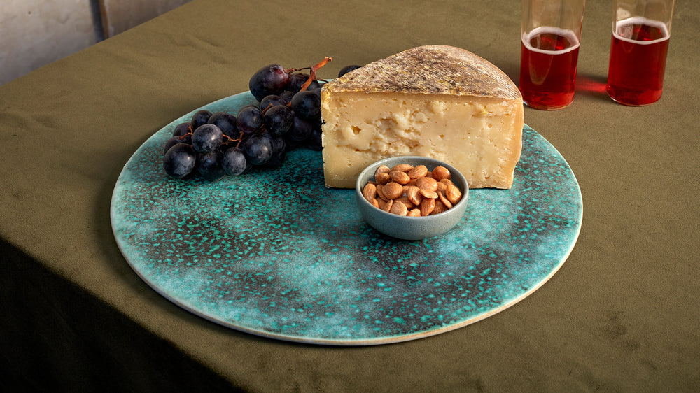 Discover Dinnerware Collections. Shop Dinning & Entertaining. Seafoam Terra Porcelain Platter Charger Plate with Cheese, Fruit and Nuts. 
