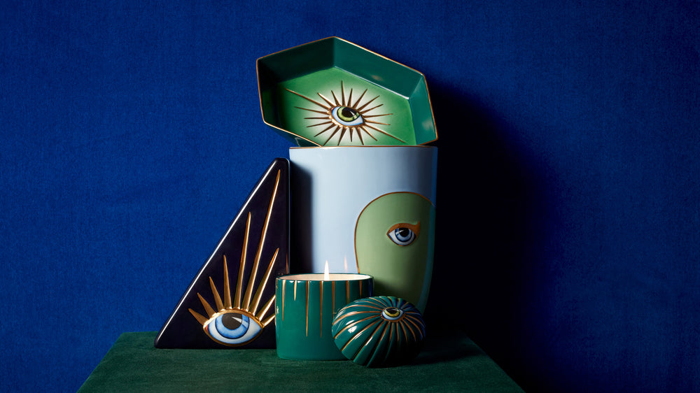 Shop New Arrivals. Discover Lito Candles & More. Lito Eye Decor Items collaged on Blue Wall with Green Velvet Surface.