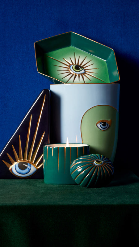 Shop New Arrivals. Discover Lito Candles & More. Lito Eye Decor Items collaged on Blue Wall with Green Velvet Surface.