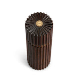 Architectural salt and pepper mills are hand carved in smoked oak with metal grinding mechanism