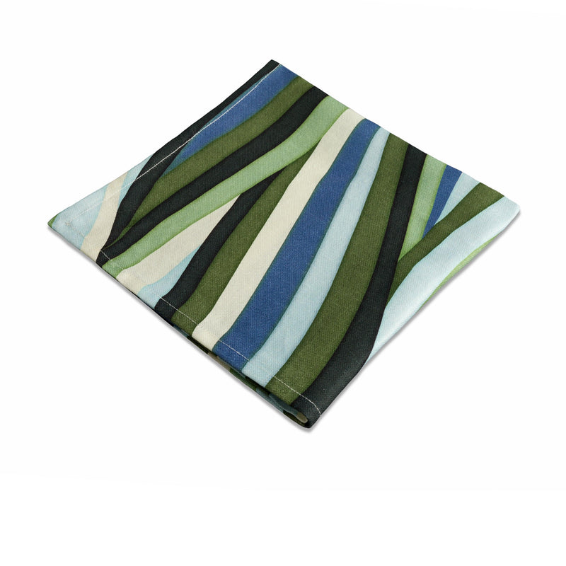 Linen napkins with an organic, undulating pattern in blue, green and ivory hues.