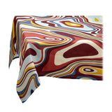 Linen rectangular tablecloth  with an organic, psychedelic pattern in red, blue, yellow and ivory hues.