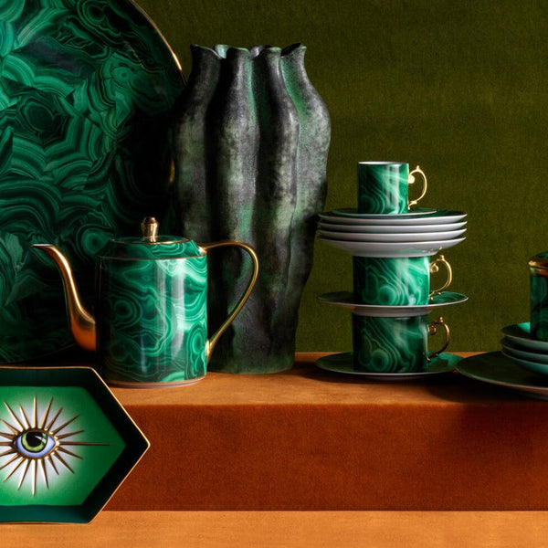 Group of L'Objet decorative objects including Malachite pattern round platter, teapot, drinkware, lito eye motif hexgonal tray, cenote vase