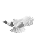 Neptune Bowl - X-Large. White porcelain shell-shaped bowl floating on a base. 