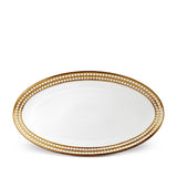Large Perlée Oval Platter in Gold - Timeless and Sophisticated Dinnerware Crafted from Porcelain and Infused with Detailed Craftsmanship
