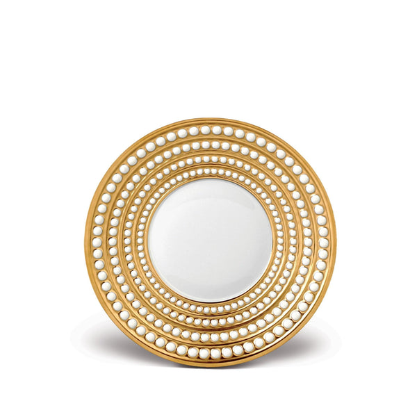 Perlée Saucer in Gold - Timeless and Sophisticated Dinnerware Crafted from Porcelain and Infused with Detailed Craftsmanship