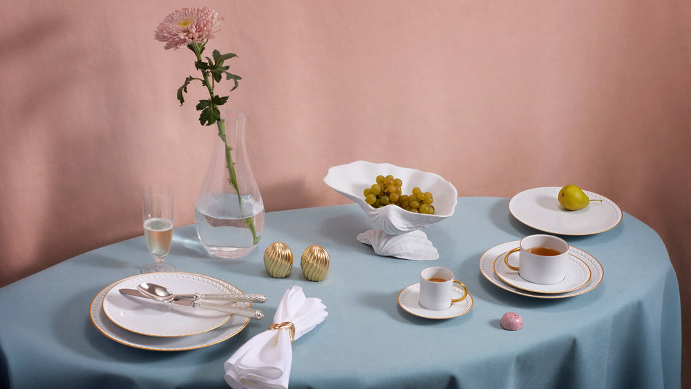 Neptune Gold Dinnerware in Table Arrangment with Iris Glassware in Pastel Color Tablescape.