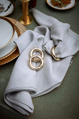 Gold napkin rings embellished with crystal star motif
