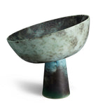 Terra Bowl on Stand - Medium. A round porcelain bowl on tall stand with green oxidized glaze.