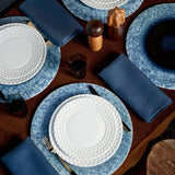 Blue round placemat set with white aegean waves pattern dinnerware