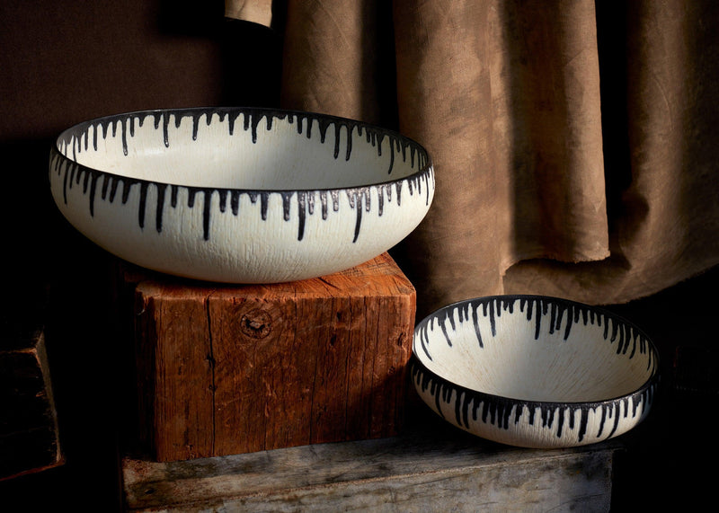 Set of 2 handmade porcelain decorative bowls with indigo dye drops to flowing down from the rim.