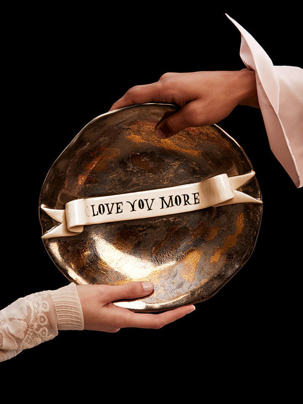 Love You More Plate Held by two opposite hands